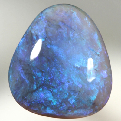 SOLID BLACK CRYSTAL OPAL Lustrous colours of gold green turquoise to blue and purple